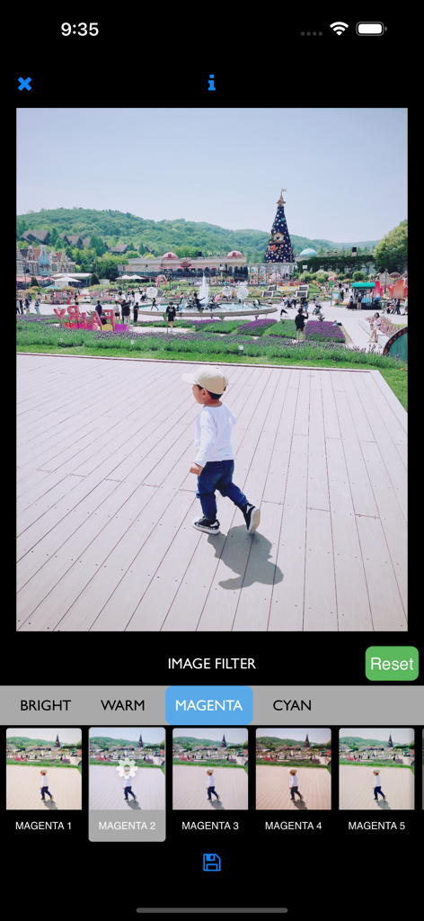 TAPCA - The TAPCA app interface showing a photo being edited with magenta color filters