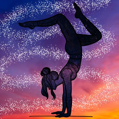 a woman doing a handstand