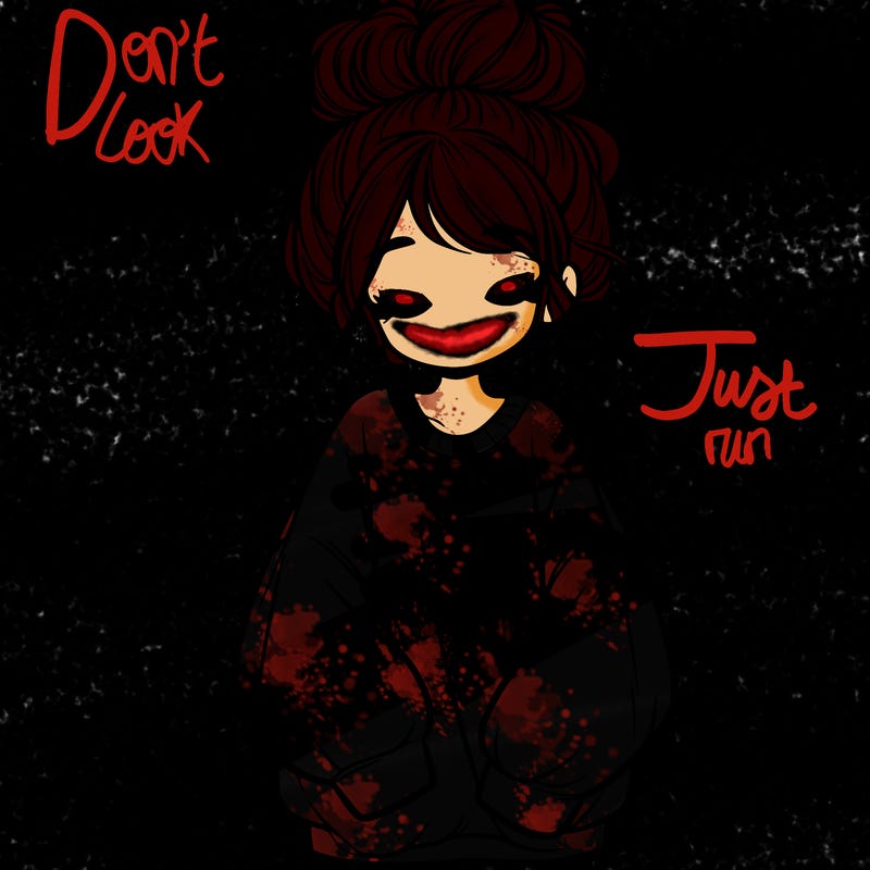 girl with baggy sweatshirt and messy bun