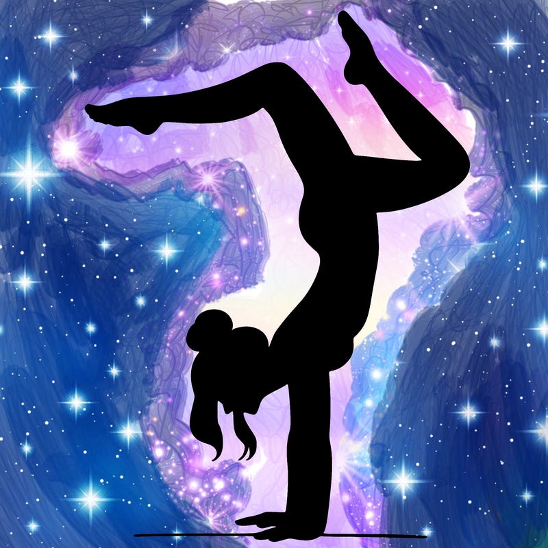 a woman doing a handstand