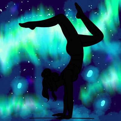 a woman doing a handstand