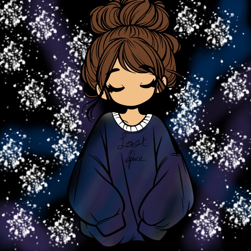 girl with baggy sweatshirt and messy bun