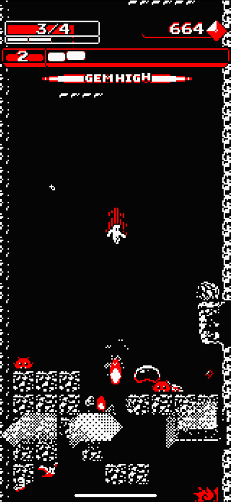 Downwell - A high-contrast black white and red pixel art gameplay screenshot of Downwell showing the character falling and shooting gunboots at red enemies.