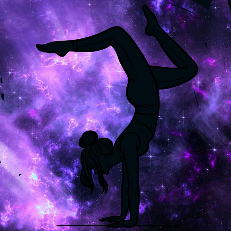 a woman doing a handstand