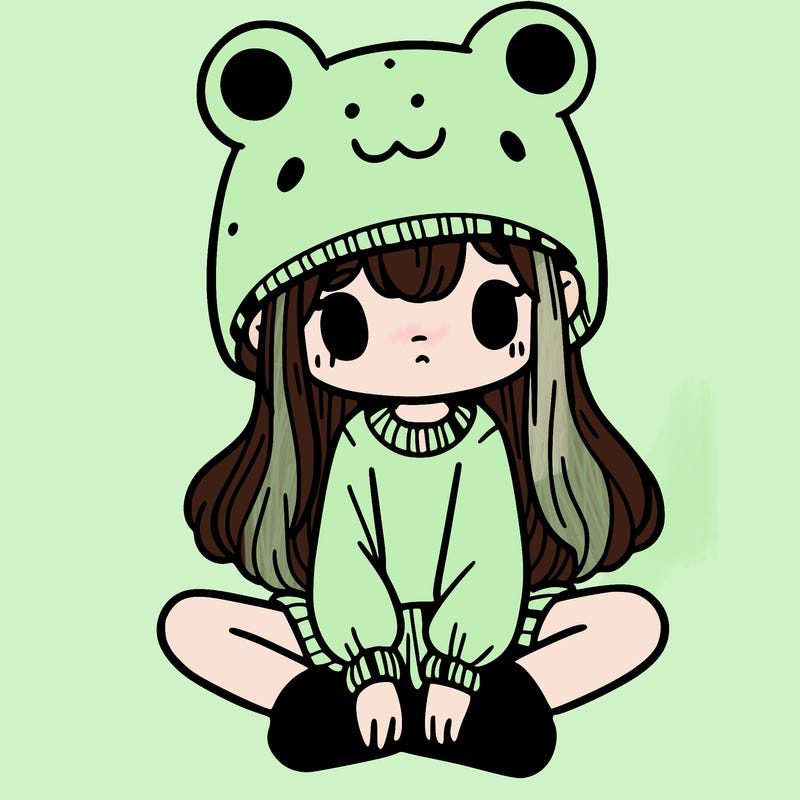 a girl wearing a frog hat and some frog socks