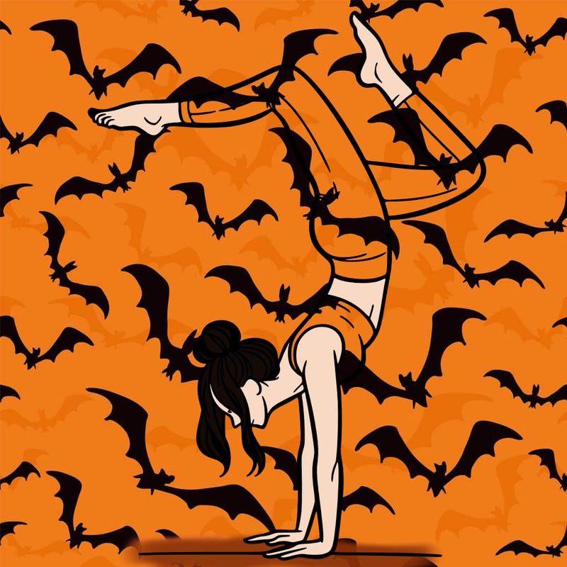 a woman doing a handstand