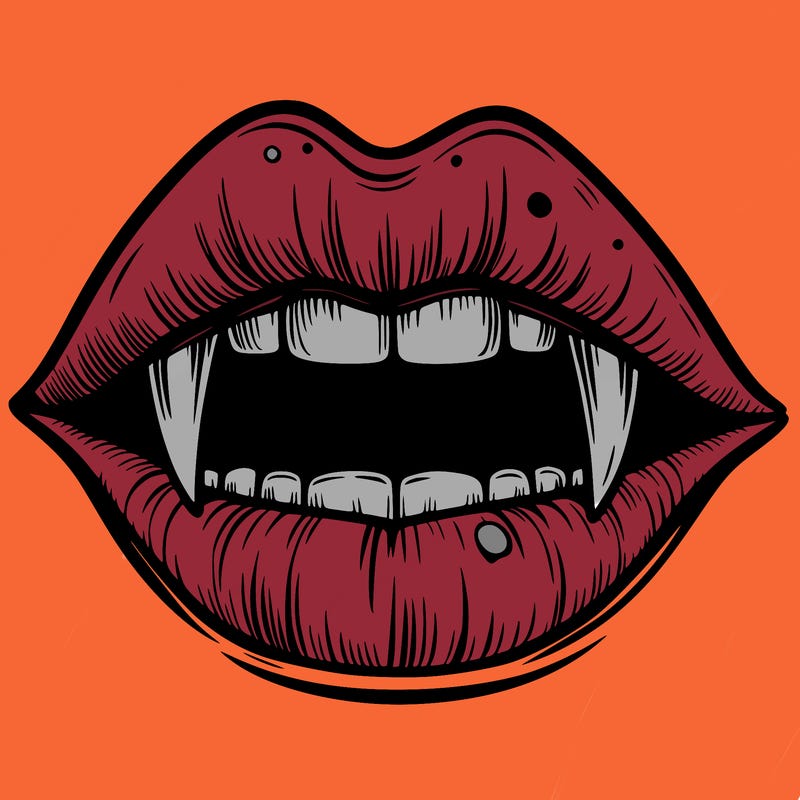 lips with vampire teeth