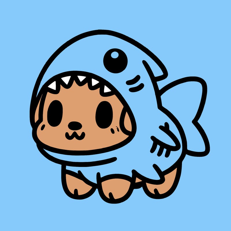 cute dog wearing a shark costume