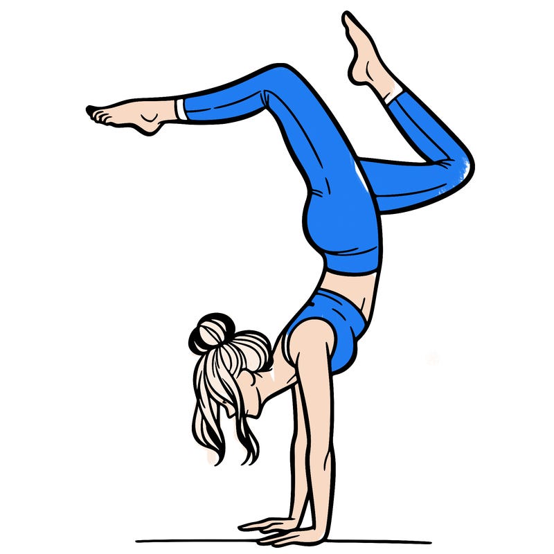 a woman doing a handstand
