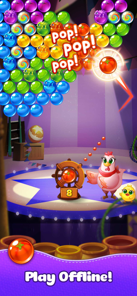 Bubble CoCo match 3 shooter gameplay with a pink hen and fruit bubbles on a circus stage