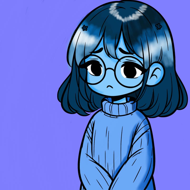 sad girl with glasses in a sweater