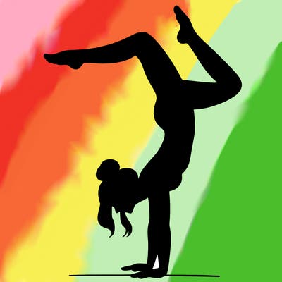 a woman doing a handstand
