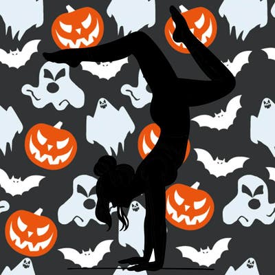 a woman doing a handstand