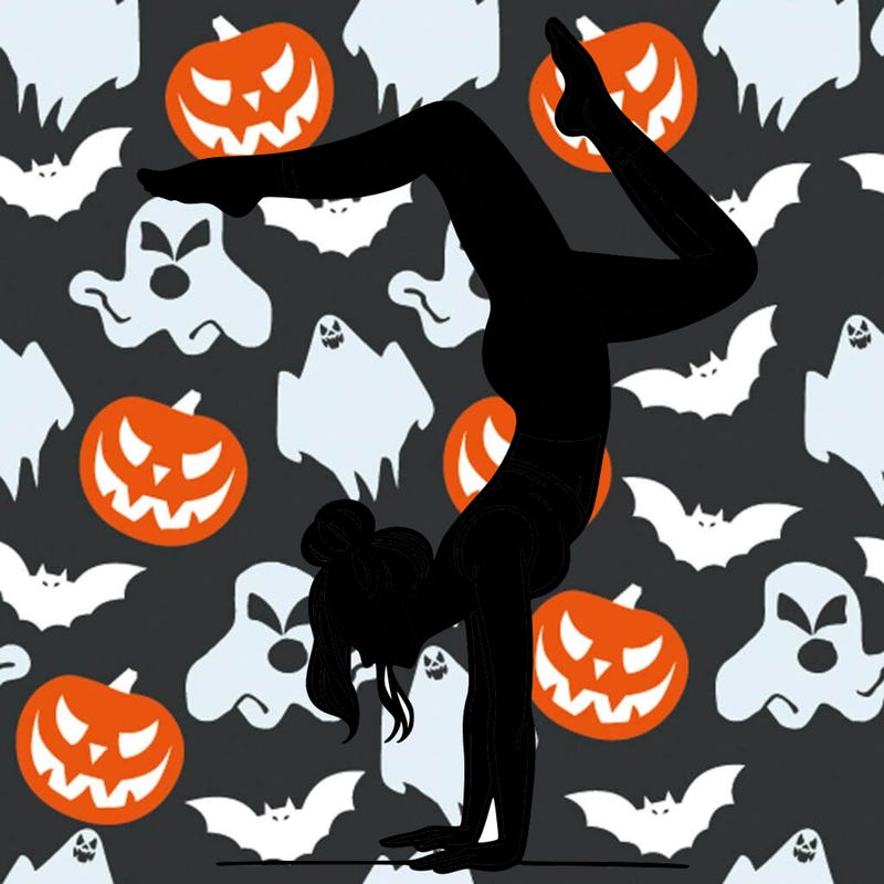 a woman doing a handstand