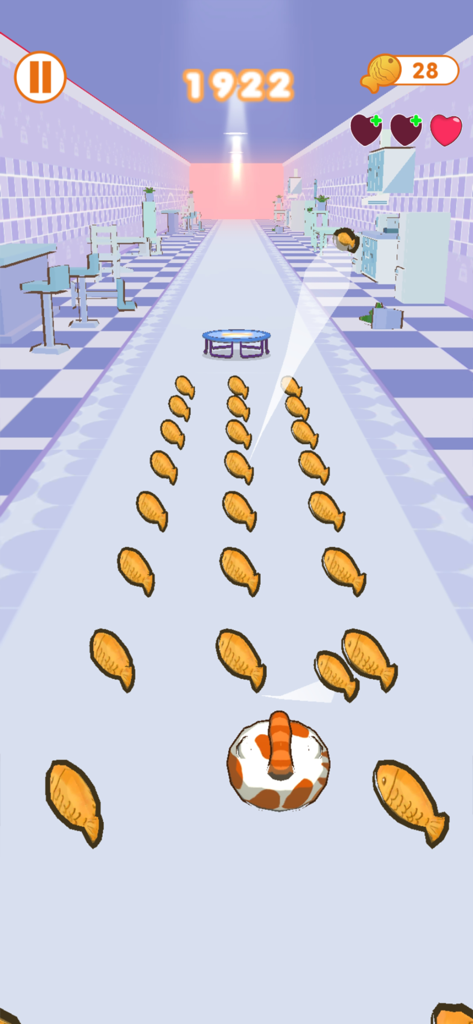 Cats HOP - A round calico cat character collecting fish items in a kitchen themed level of the Cats HOP game