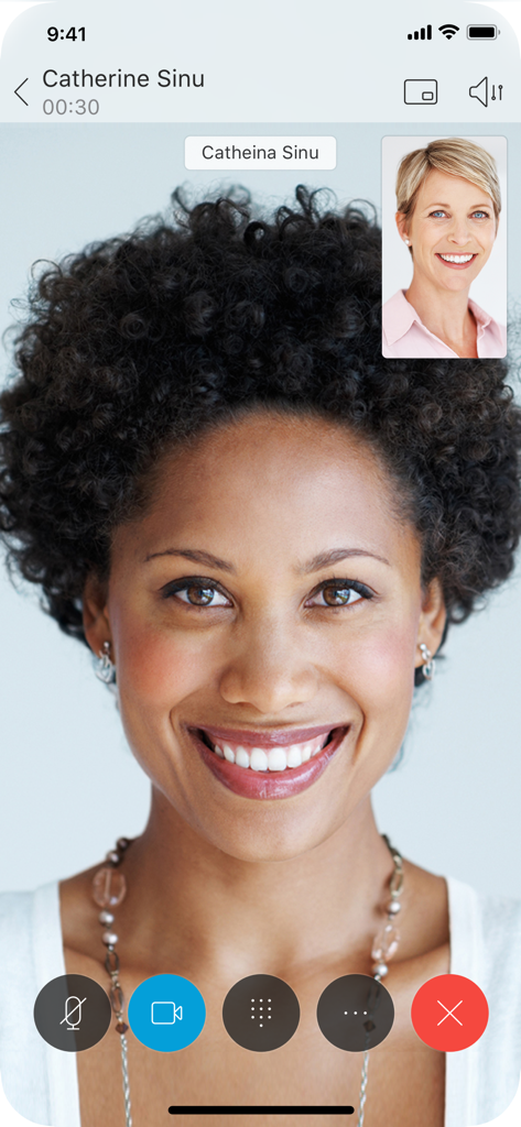 A high quality video call interface on the Cisco Jabber mobile app showing two professional women smiling.