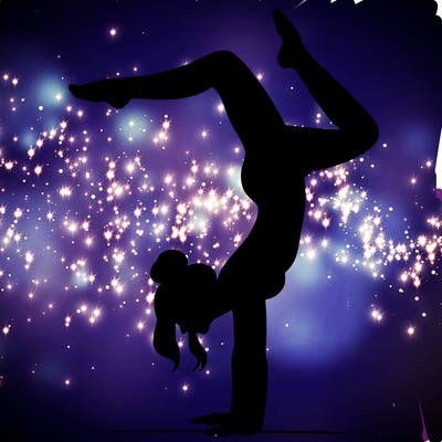 a woman doing a handstand