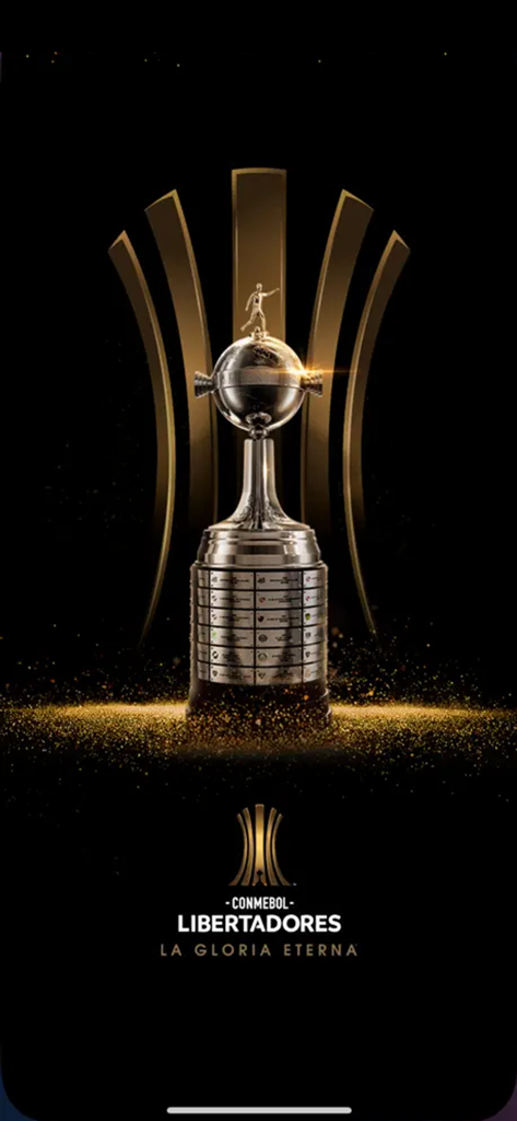 CONMEBOL Libertadores - Trofeo oficial de la CONMEBOL Libertadores sobre un fondo negro con destellos dorados