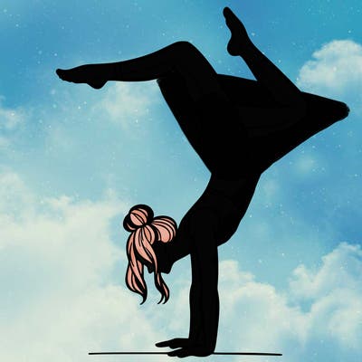 a woman doing a handstand