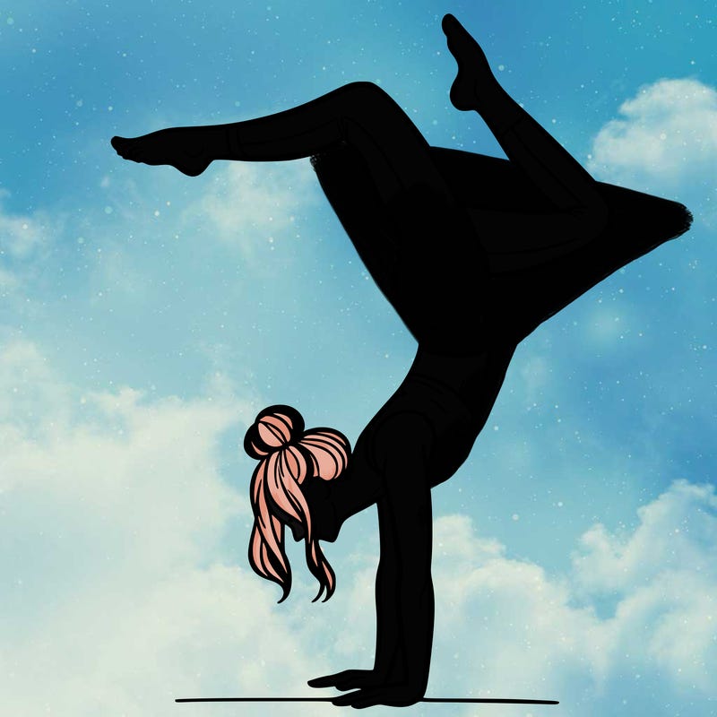 a woman doing a handstand