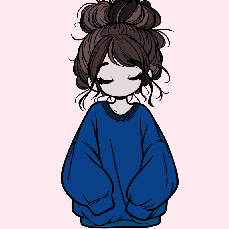 girl with baggy sweatshirt and messy bun