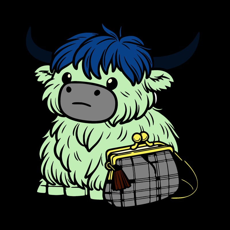 highland cow in a purse