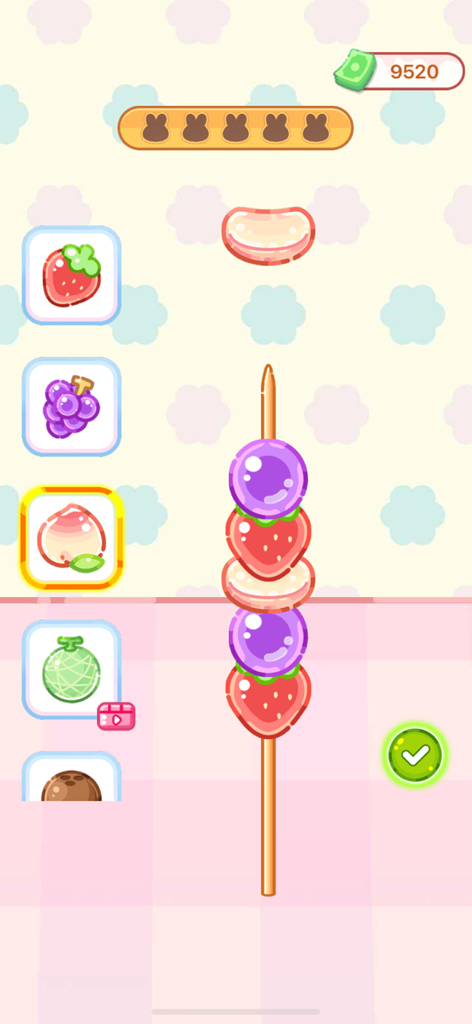 Crystal Candy:Mukbang ASMR - A colorful game interface showing fruit shaped candies being stacked on a wooden skewer to make a Tanghulu treat.