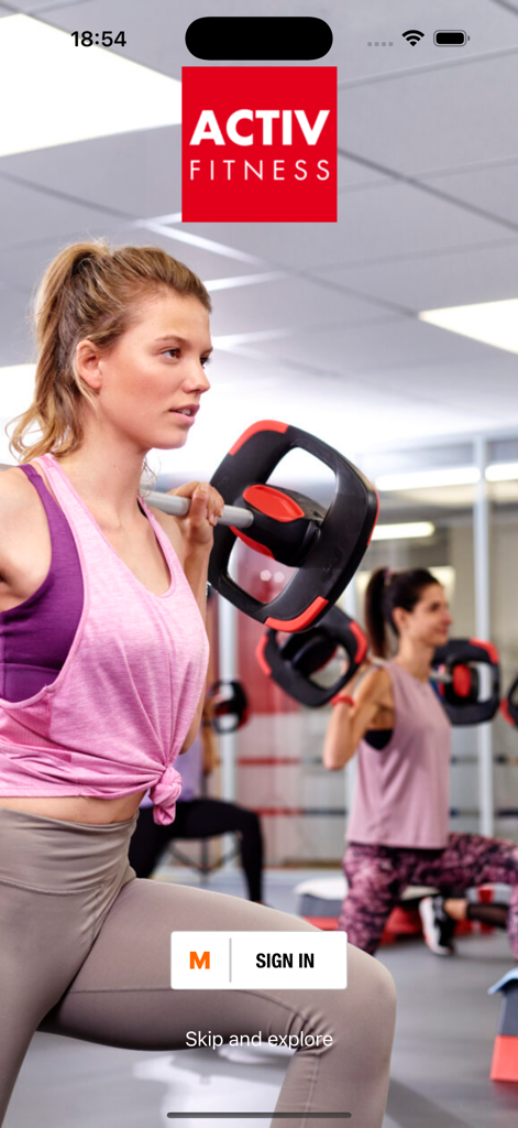 ACTIV FITNESS - The ACTIV FITNESS app login screen featuring women in a group fitness class with a sign in button.