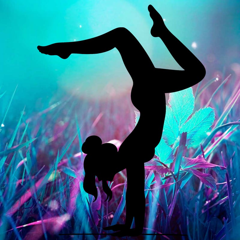 a woman doing a handstand