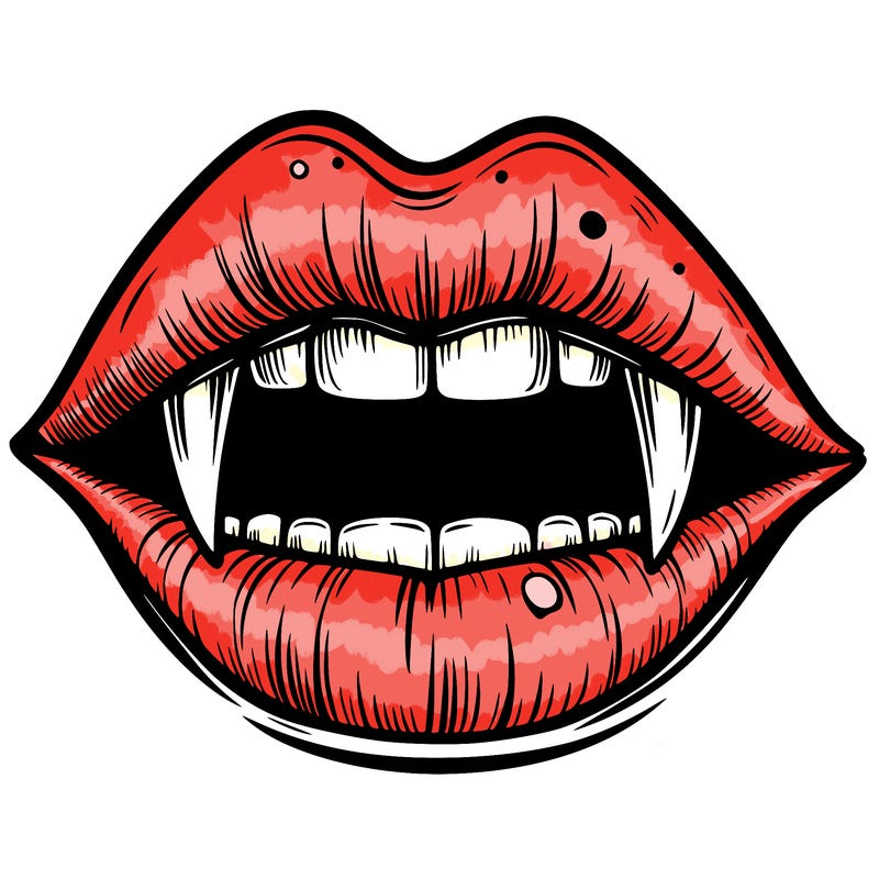 lips with vampire teeth