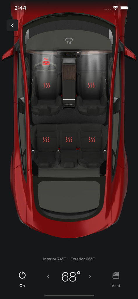 Tesla app interface showing interior temperature and seat heater controls for a vehicle