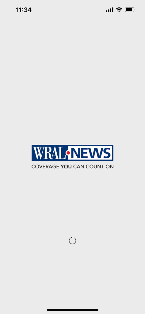 WRAL News Mobile - WRAL News mobile app splash screen displaying the logo and slogan Coverage You Can Count On