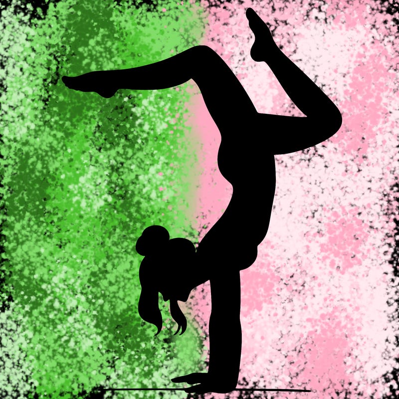 a woman doing a handstand