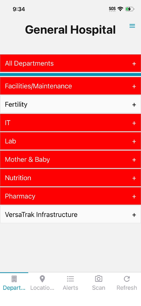 VersaTrak Mobile - ステータスアラートが表示された監視対象の病院部門リストを示すVersaTrak Mobileアプリのダッシュボード。