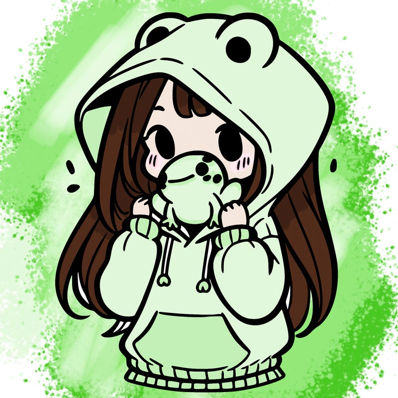 a girl holding a froggy hoodie