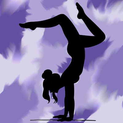 a woman doing a handstand