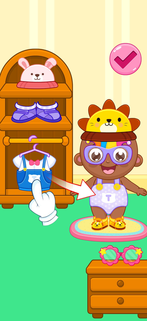 Take Care of a Baby Doll Games - Preschooler playing a baby doll dress up game with colorful clothes and accessories.