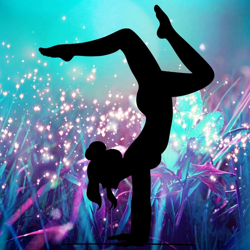 a woman doing a handstand