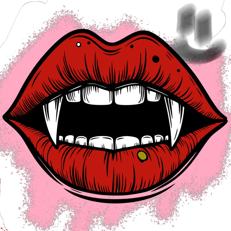 lips with vampire teeth