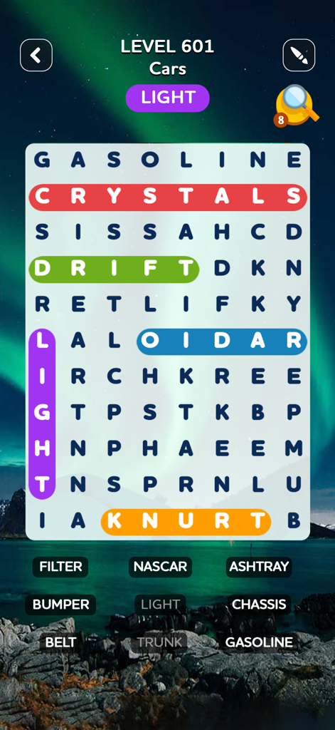 Word Search Quest Puzzles - Word search puzzle grid with car-themed words and a beautiful Northern Lights background