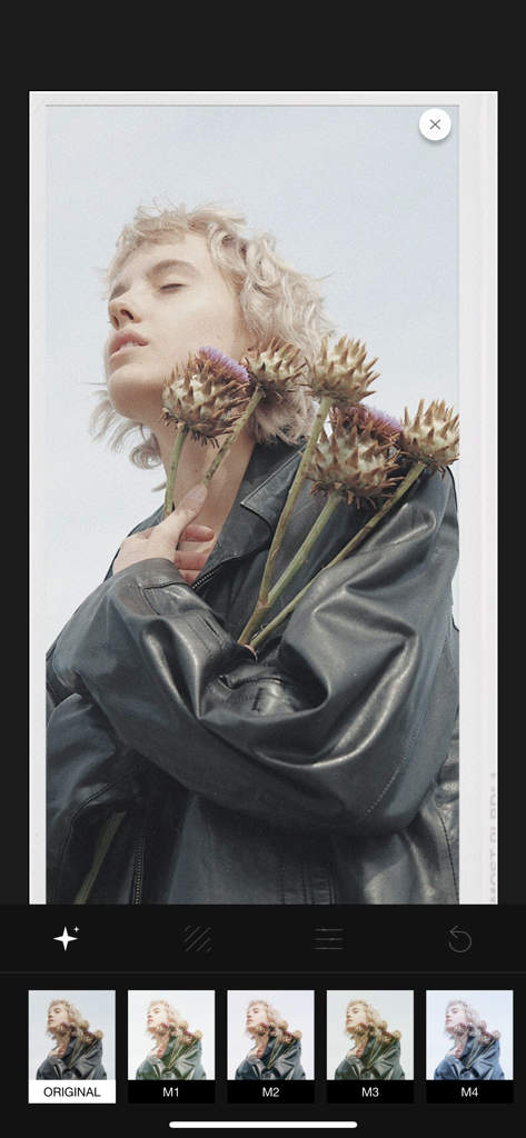 A woman portrait being edited with aesthetic filters in the Most app interface