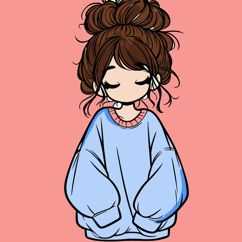 girl with baggy sweatshirt and messy bun