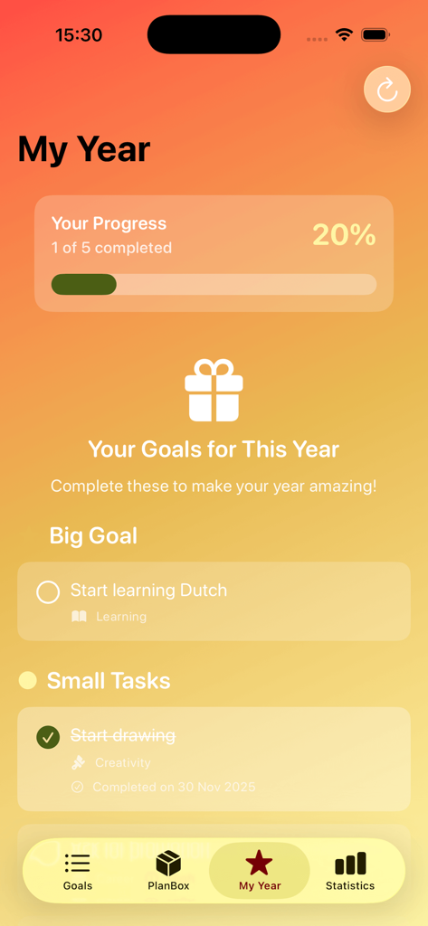 Interfaz de la aplicación Plan Spin Box que muestra el progreso anual y un gran objetivo para comenzar a aprender holandés