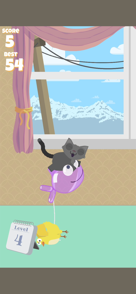 A grey cat landing on a purple fish balloon in the Toasty Crackers mobile game