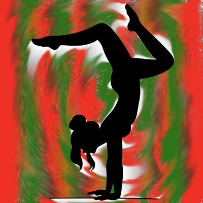 a woman doing a handstand