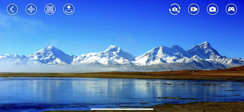 Interface de l'application Rx Drone affichant une vue de caméra FPV en direct sur des montagnes enneigées et des boutons de contrôle.