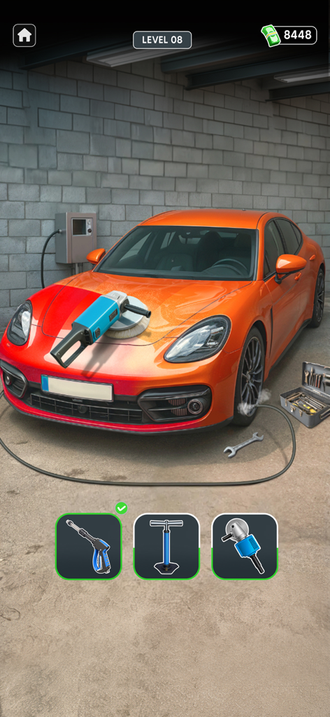 Car Wash Games: Repair Garage - An orange sports car being polished in a car wash and repair garage simulation game
