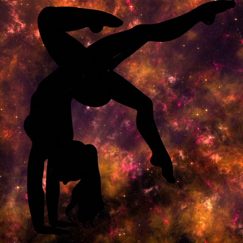 a woman doing a handstand