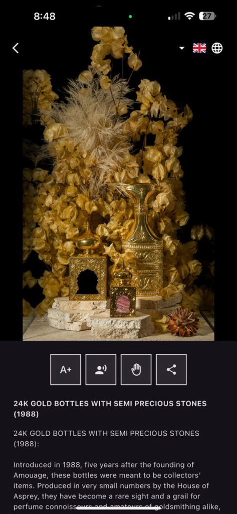Amouage Visitors' Center - Display of 24K gold perfume bottles with semi precious stones in the Amouage app