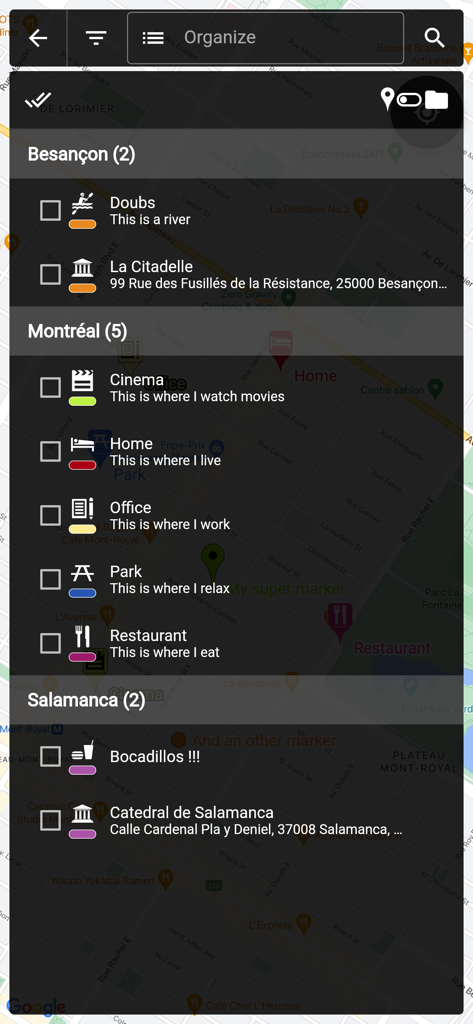 Una pantalla que muestra una lista de marcadores de mapa guardados organizados en carpetas por nombre de ciudad